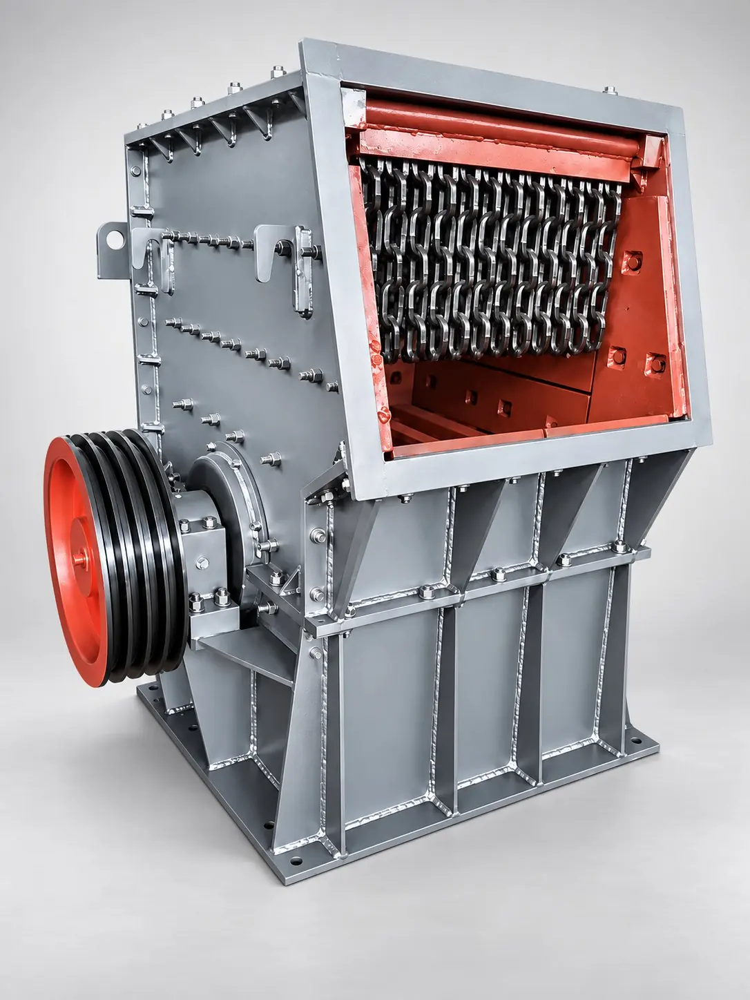 Hammer crusher with its inspection door open, showing rows of hammers and the drive pulley